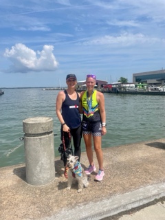 Emily with Coach Joy after a race